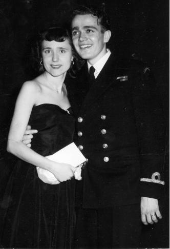 Dr. Rowland Marshall wearing a military suit and his wife standing together
